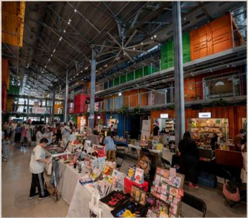 Beit Hamecholot market interior with shipping container stalls